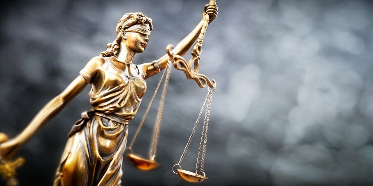 Legal and law concept statue of Lady Justice with scales of justice